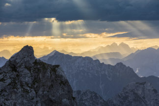 Cloudy sunset in Julian Alps. A view to the Italian alps and Dolomites