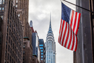 Chrisler building architecture with american flag, New york