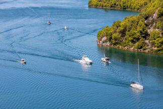 Sailing in canyon of Krka river