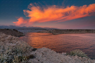 Pag bridge at sunset with colorful cloud