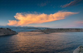 Pag bridge at sunset with colorful cloud