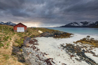 Norway Grøtfjord beach at cloudy sunset