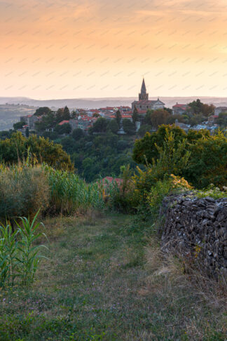 Groznjan old town on the hill at sunset