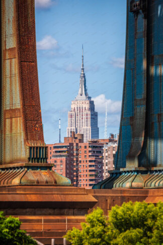 Empire State Building view trougr Brooklyn Bridge in New York