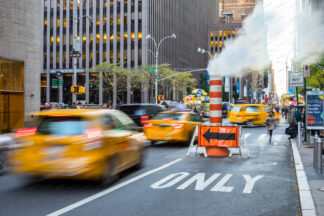 New York traffic and steam pipe on the street (49st)