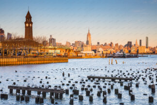 Clock tower in Hoboken, New Jersey. New York in a distance