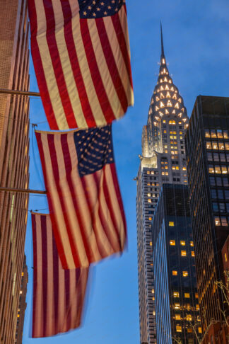 Chrysler buildeing with american flags in New York City