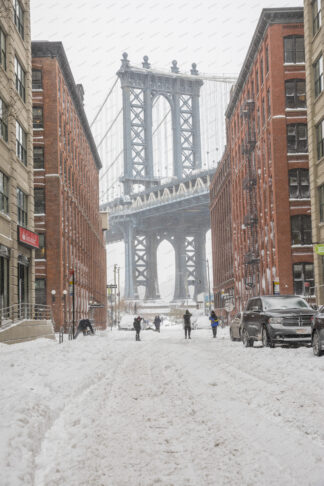 Heavy snowfall in Washington street a view to Manhattan bridge; Dumbo, New York City