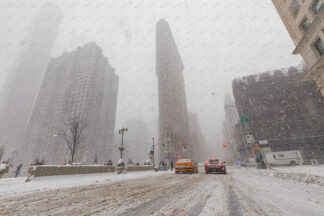 Flatiron building at heawy snow storm in New York City