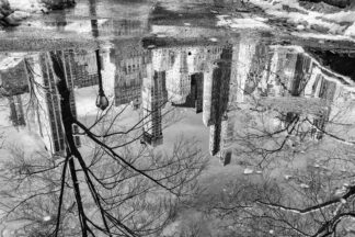 Water reflection of Manhattan buildings in Central park, New York