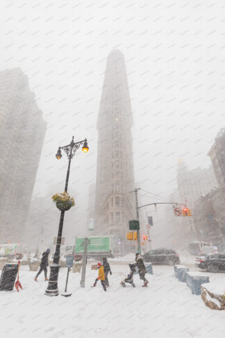 Flatiron building in 5ave at snow storm in New York City