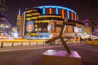 Traffic at Madison Square Garden at night in New York City