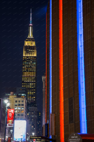 Madison Square Garden building illuminated lights and  Empire State Building in New York City