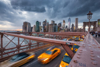 New York Downtown over Brooklyn bridge at cloudy day