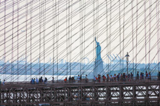 Statue of Liberty trough the Brooklyn bridge, new York City