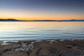 Beach sunset, Krk island in front, Croatia