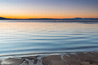 Beach sunset, Krk island in front, Croatia